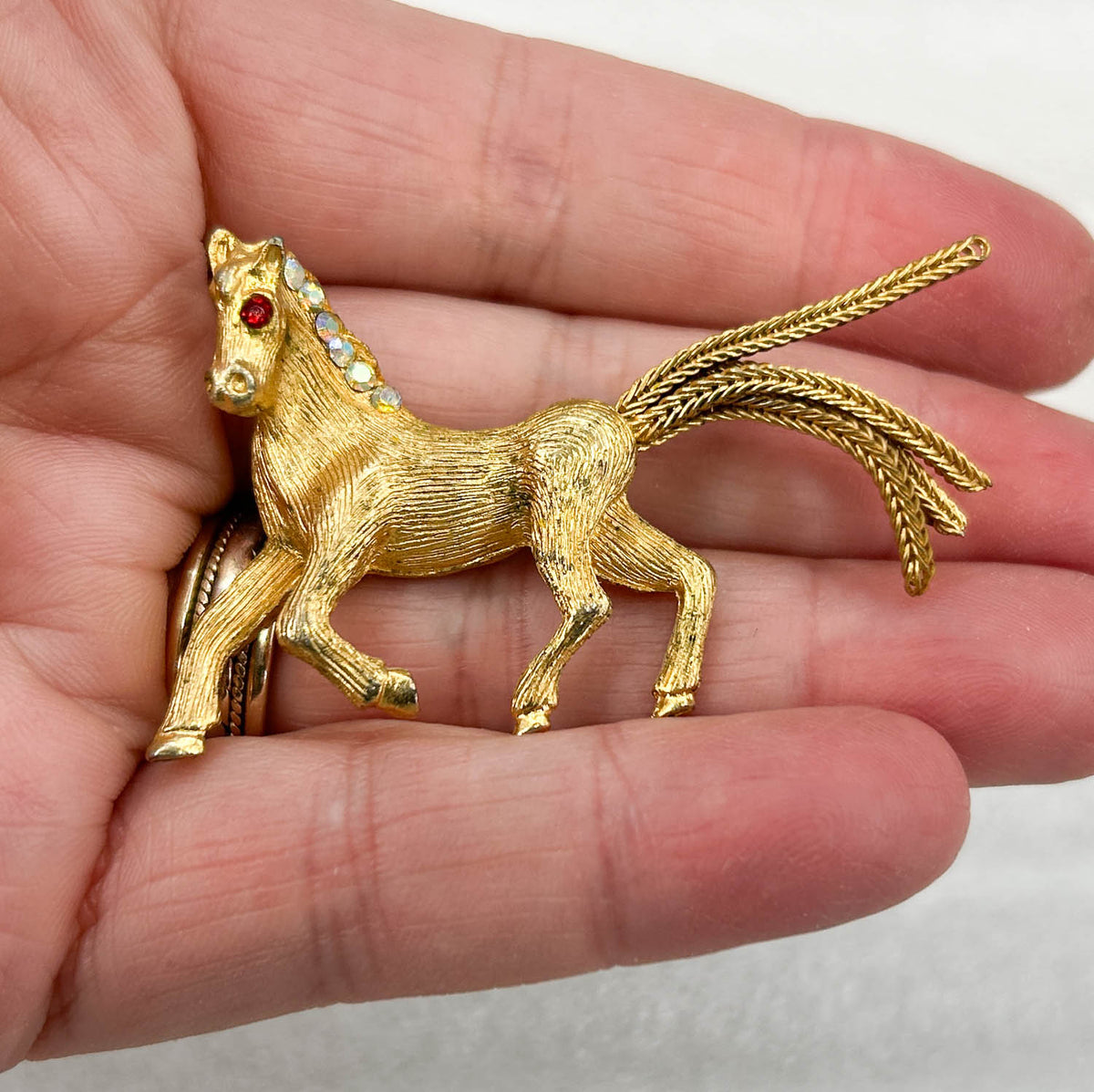 1970s Pin:  Goldtone horse with Jeweled Mane from Eleda's herd