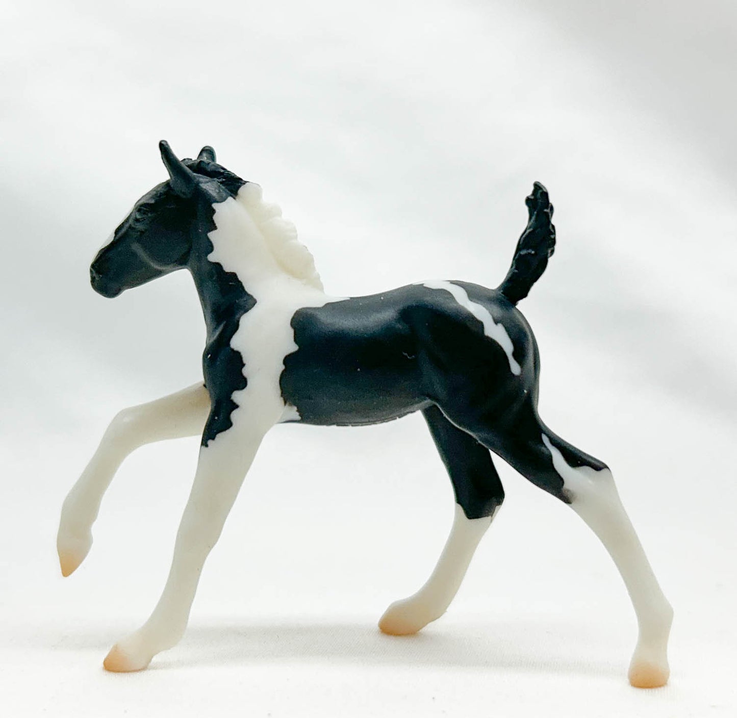 Galloping Draft Foal, Black Pinto - TSC 2024