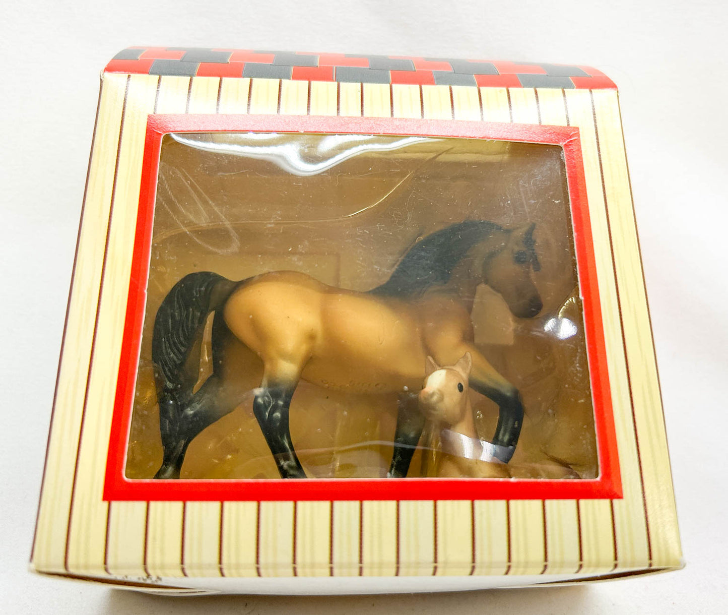 Morgan Stallion and Thoroughbred Lying Foal, Buckskin
